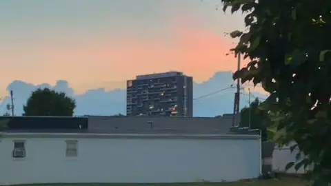 City lights meet a painted sky.